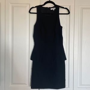 Little black dress with peplum skirt